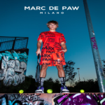 Marc De Paw Orange Shorts with Black Brush Stroke Graphics - Image 3