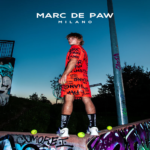 Marc De Paw Orange Shorts with Black Brush Stroke Graphics - Image 2